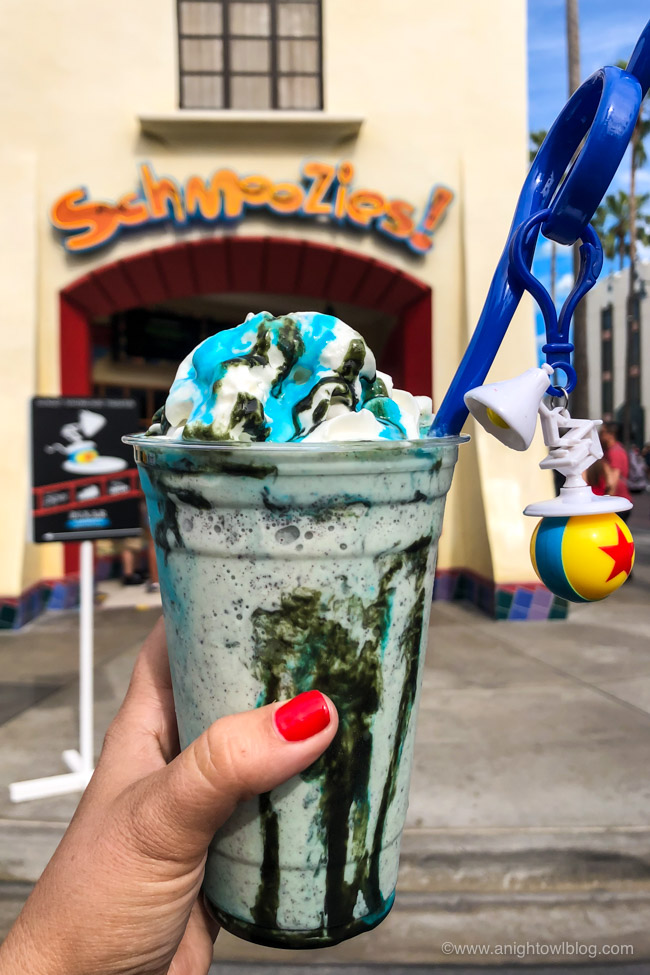 Mint Chip Shake from Schmoozies, Disney California Adventure Park, Hollywood Land | From Cheeseburger Pizza from Alien Pizza Planet to the Toy Story Root Beer Float in a Souvenir Boot, check out our picks for The BEST Disneyland Pixar Fest Food finds! #Disneyland #PixarFest