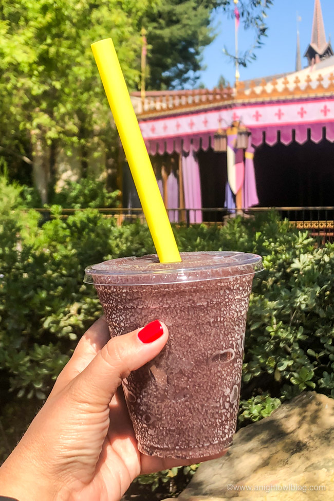 Grape Soda Slush from the Coffee Cart, Main Street, U.S.A, Disneyland Park | From Cheeseburger Pizza from Alien Pizza Planet to the Toy Story Root Beer Float in a Souvenir Boot, check out our picks for The BEST Disneyland Pixar Fest Food finds! #Disneyland #PixarFest